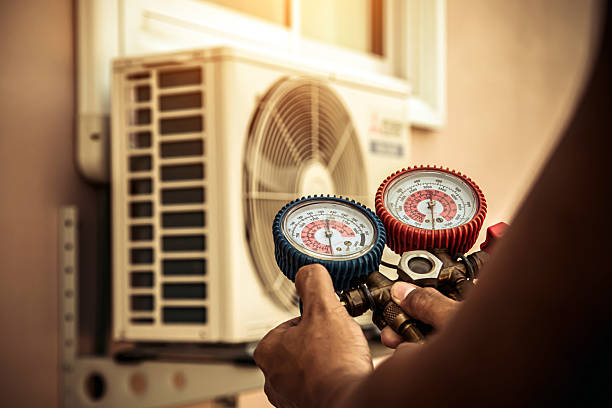 Professional Ductwork Repair technician working in Berkley, MA